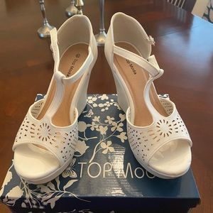 White wedge heels size 8-1/2….great condition! Worn twice!